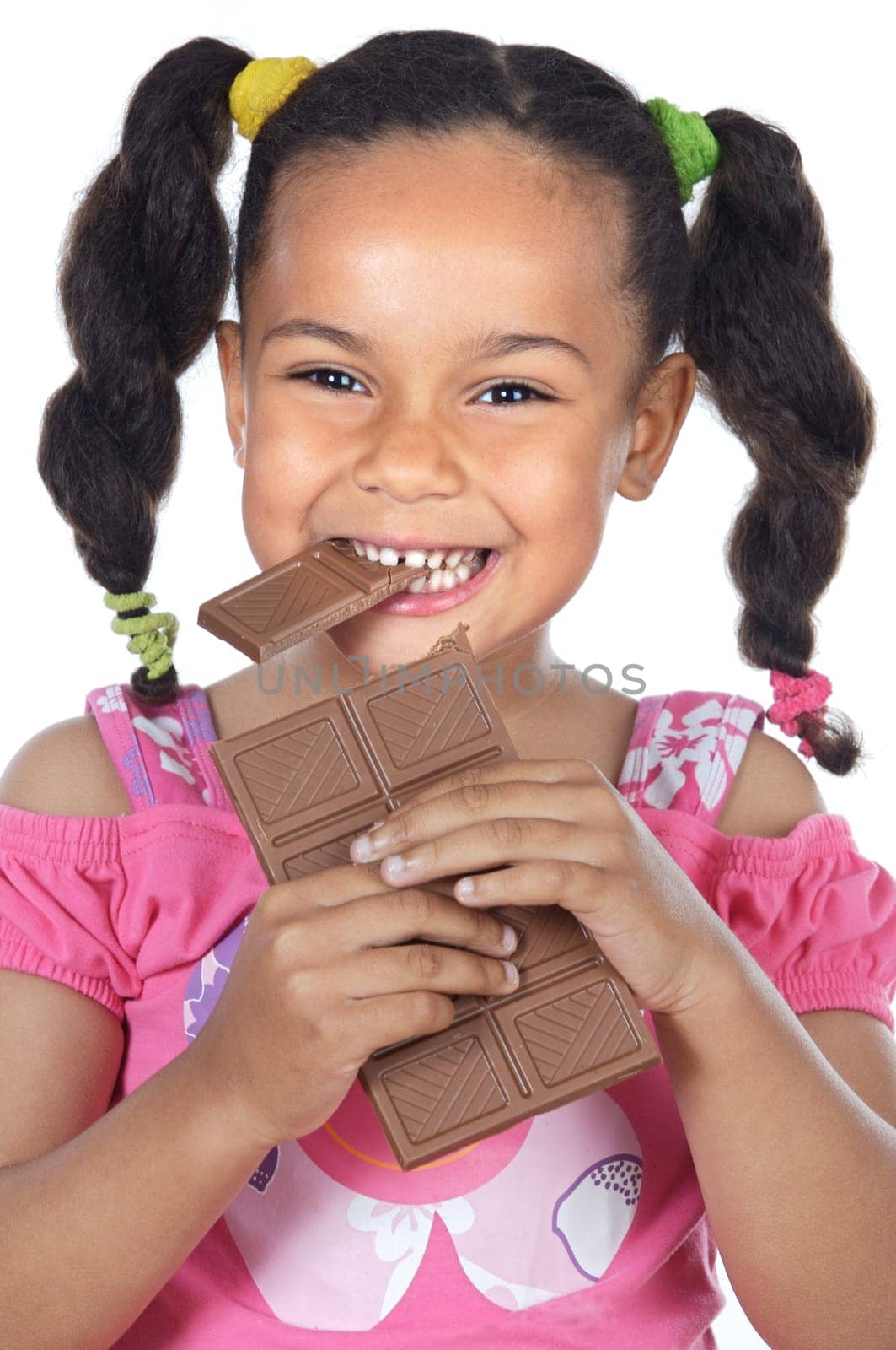 adorable girl eating chocolate
