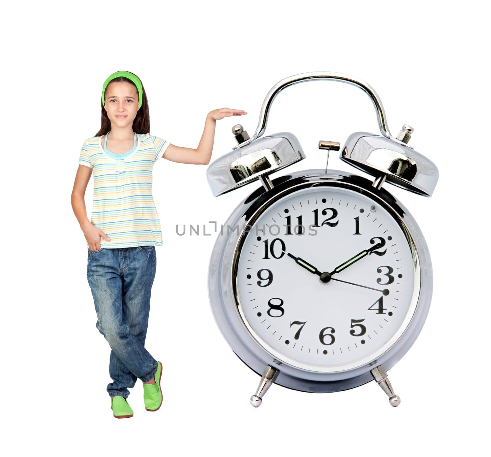 Little girl with a big alarm clock
