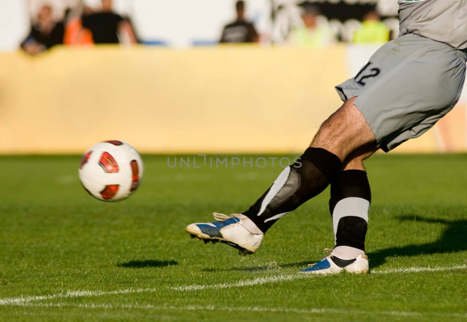 Soccer players fighting for the ball