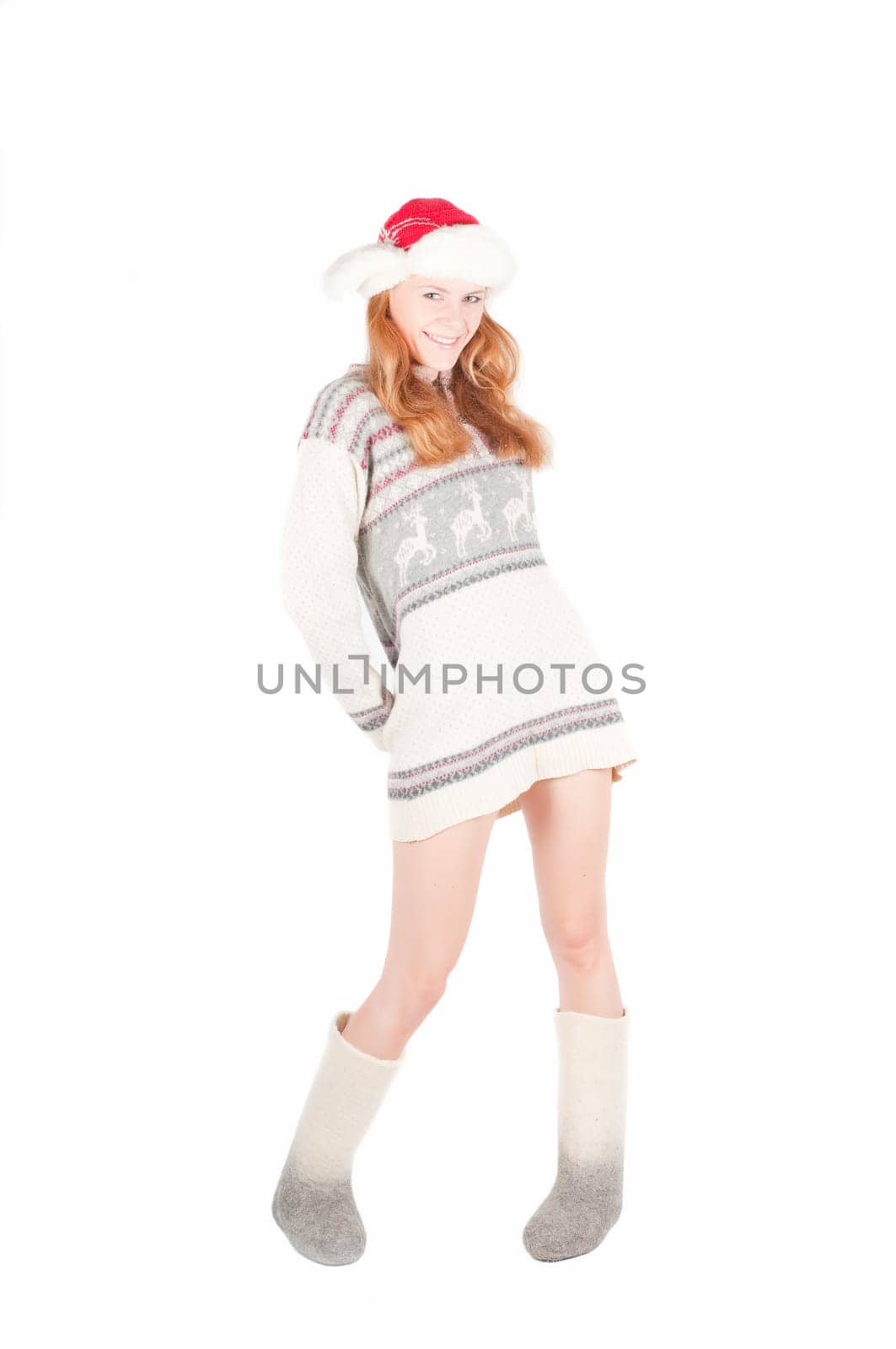 Beutiful woman in cardigan and santa hat