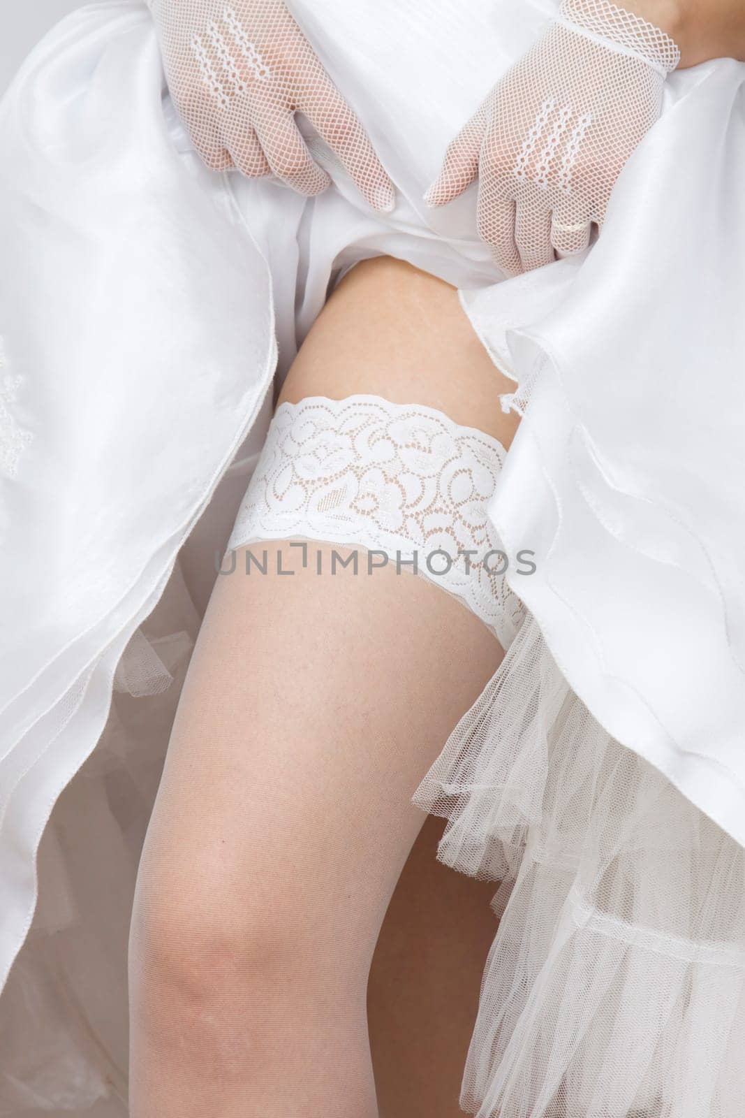 Bride shoving her stockings