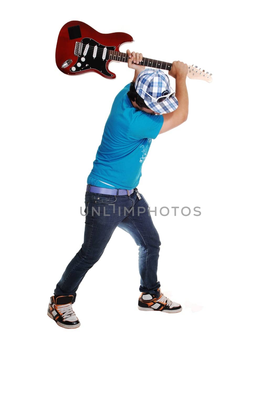 Boy mad at the guitar.