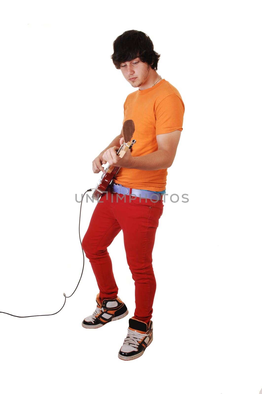 Teen boy with guitar.