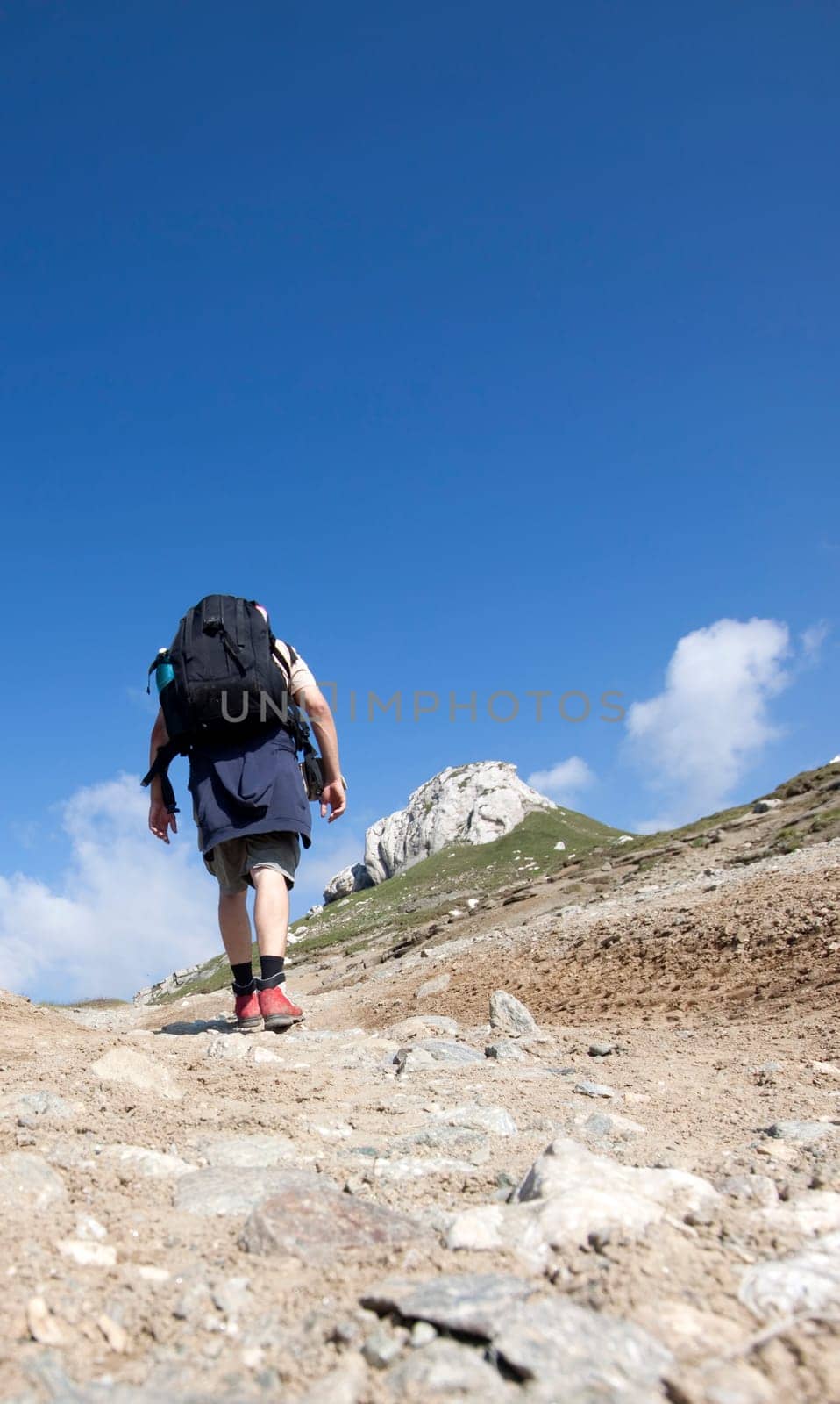 Man trekking in high mountains