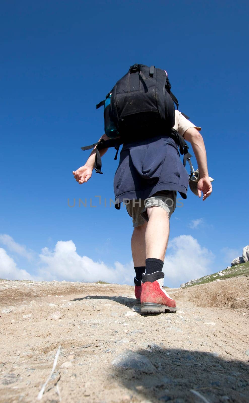 Man trekking in high mountains
