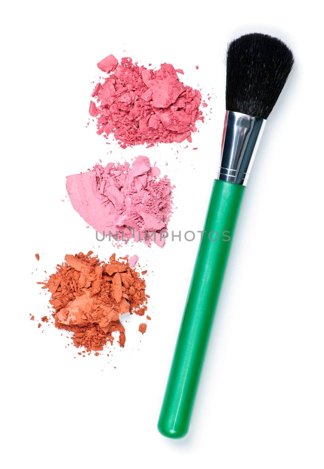 Crushed cosmetics with makeup brush
