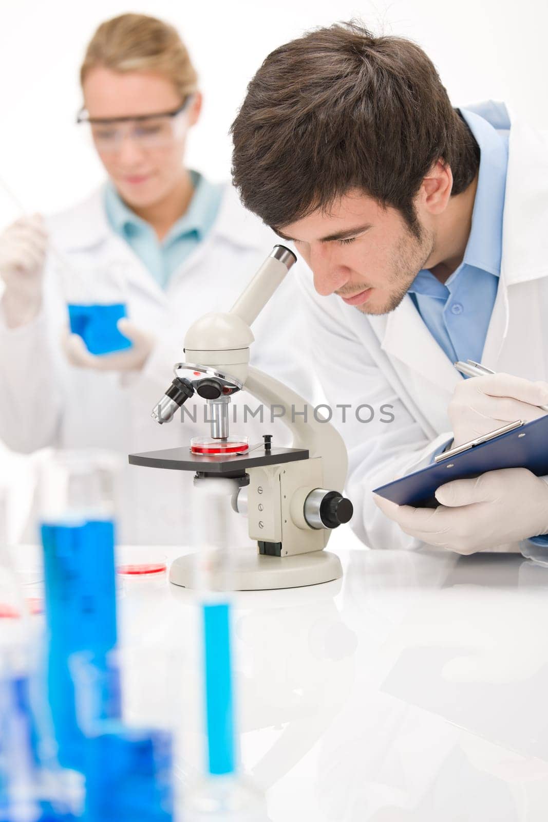 Flu virus experiment - scientist in laboratory