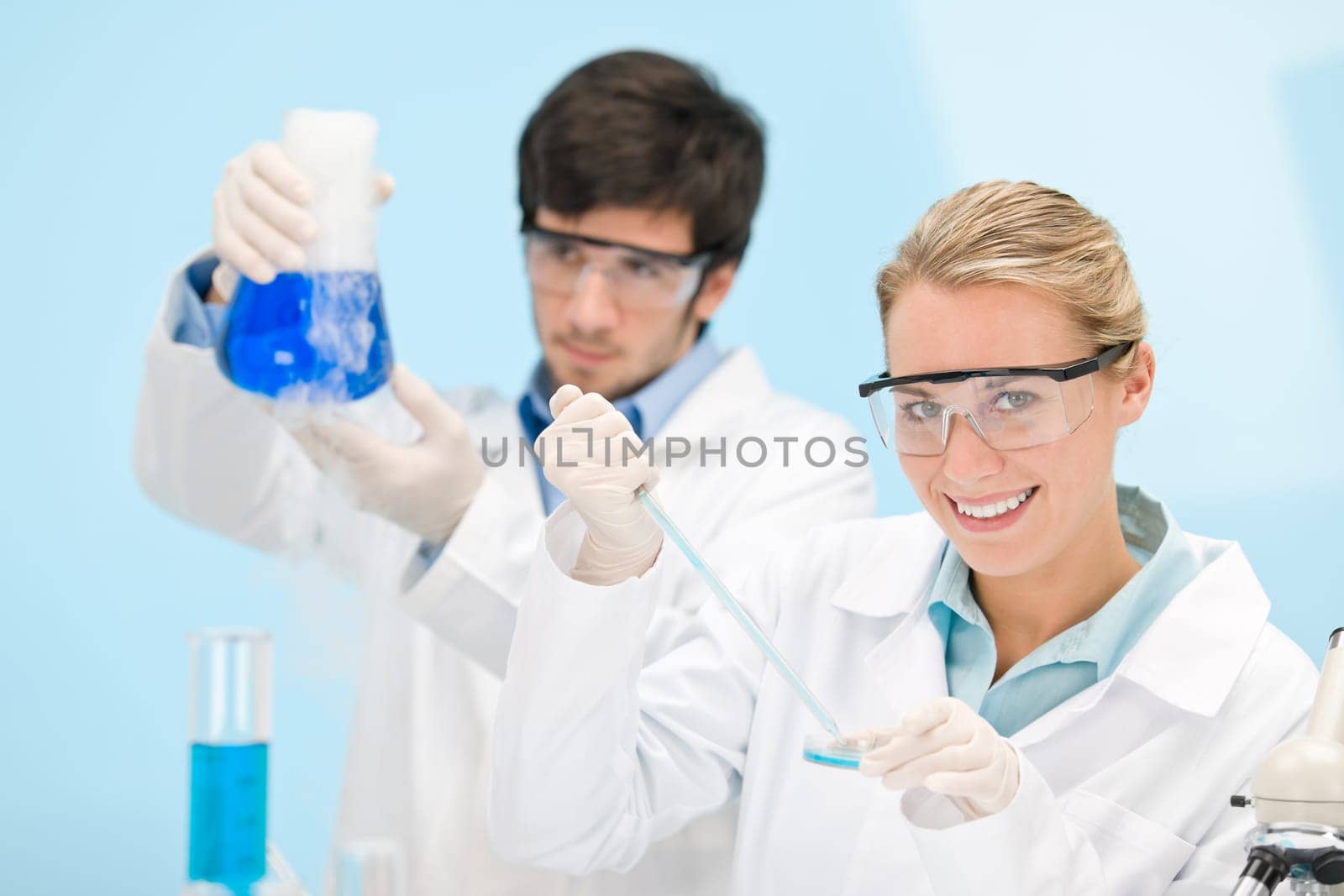 Flu virus experiment - scientist in laboratory