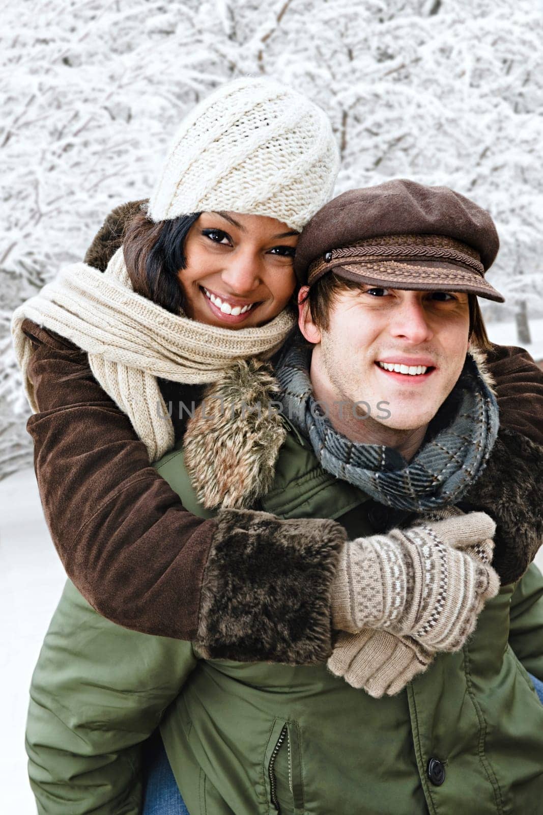 Couple having fun outside in winter