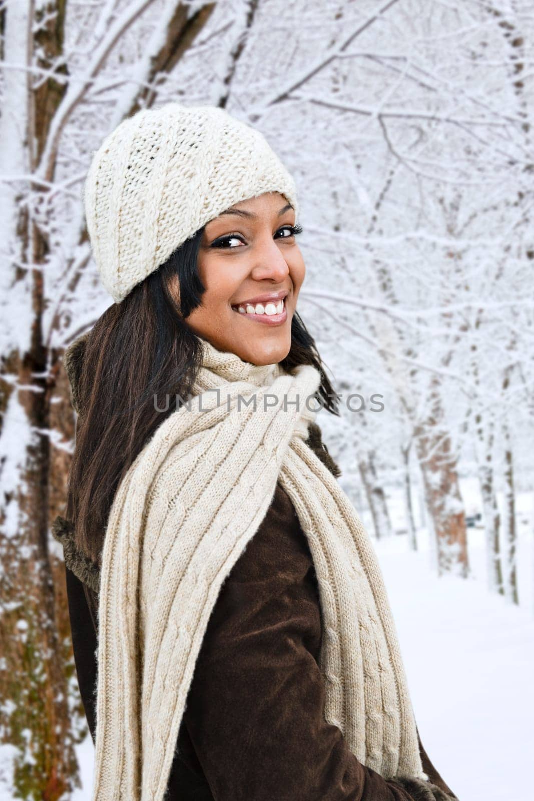 Happy woman outside in winter