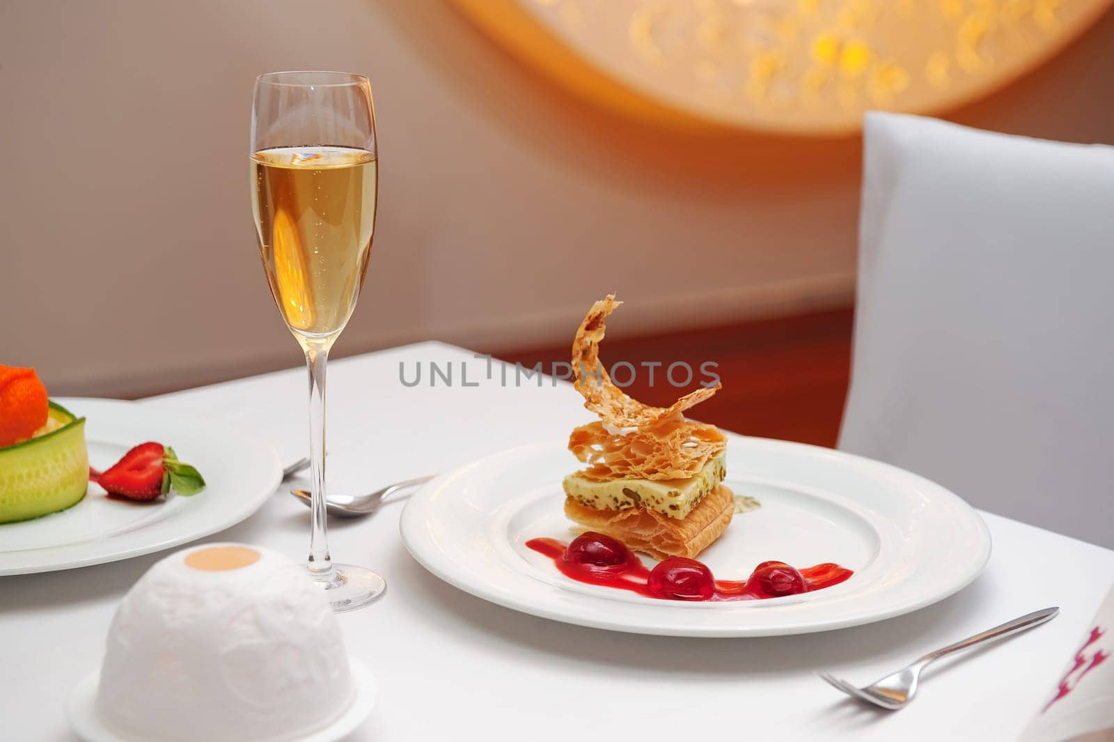 A delicious dessert with berry sauce and