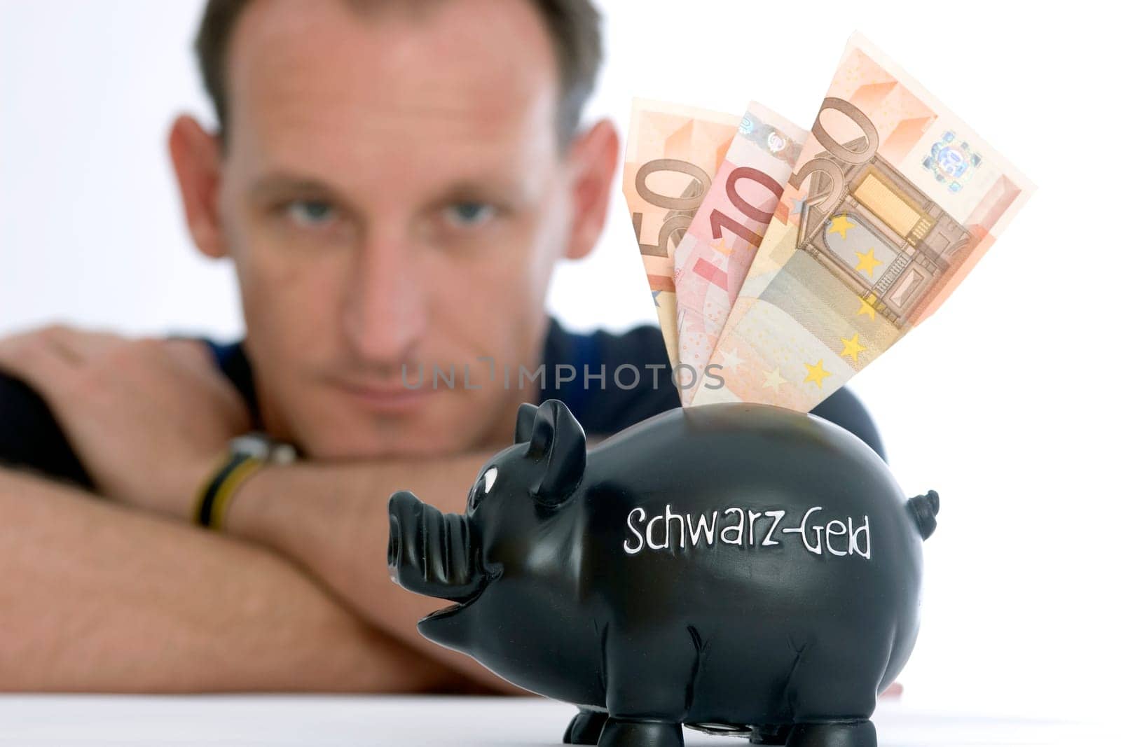 Man and piggy bank with the imprint