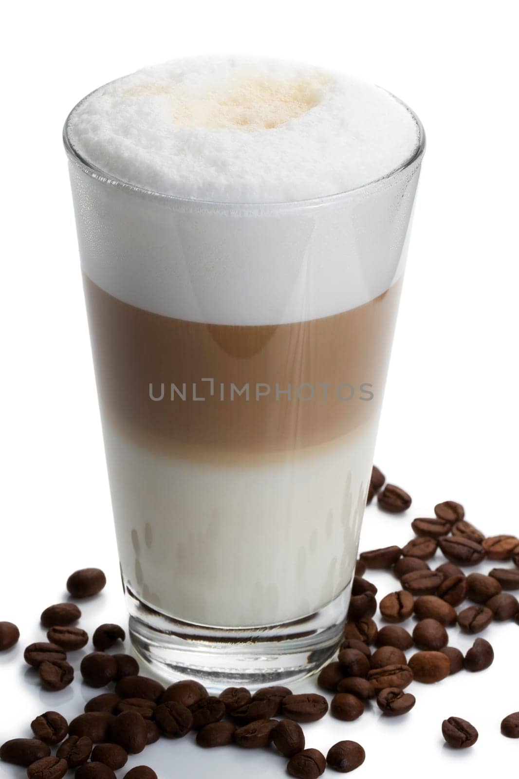 Latte macchiato with coffee beans
