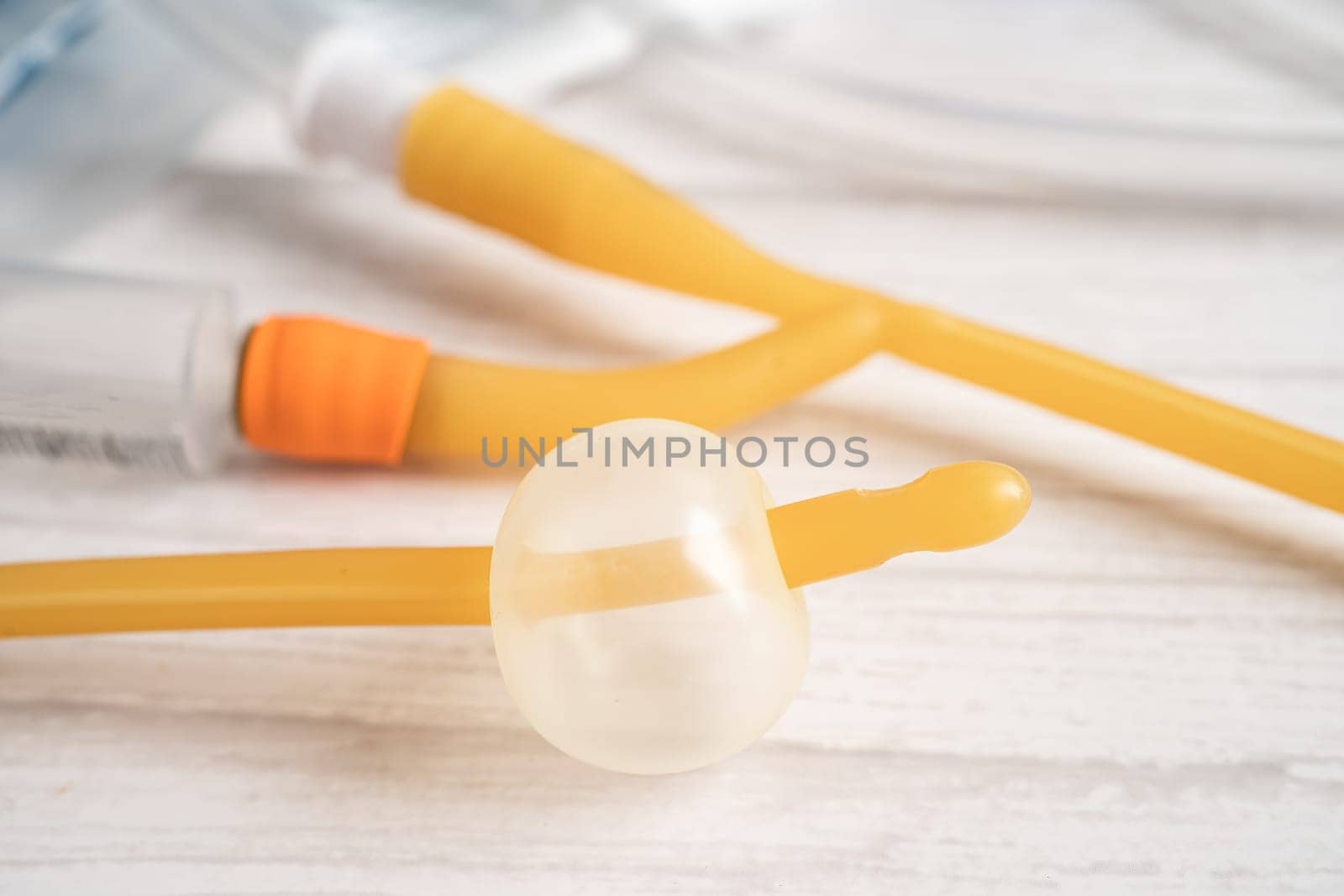 Foley urinary catheter with urine bag for disability or patient in hospital. by pamai