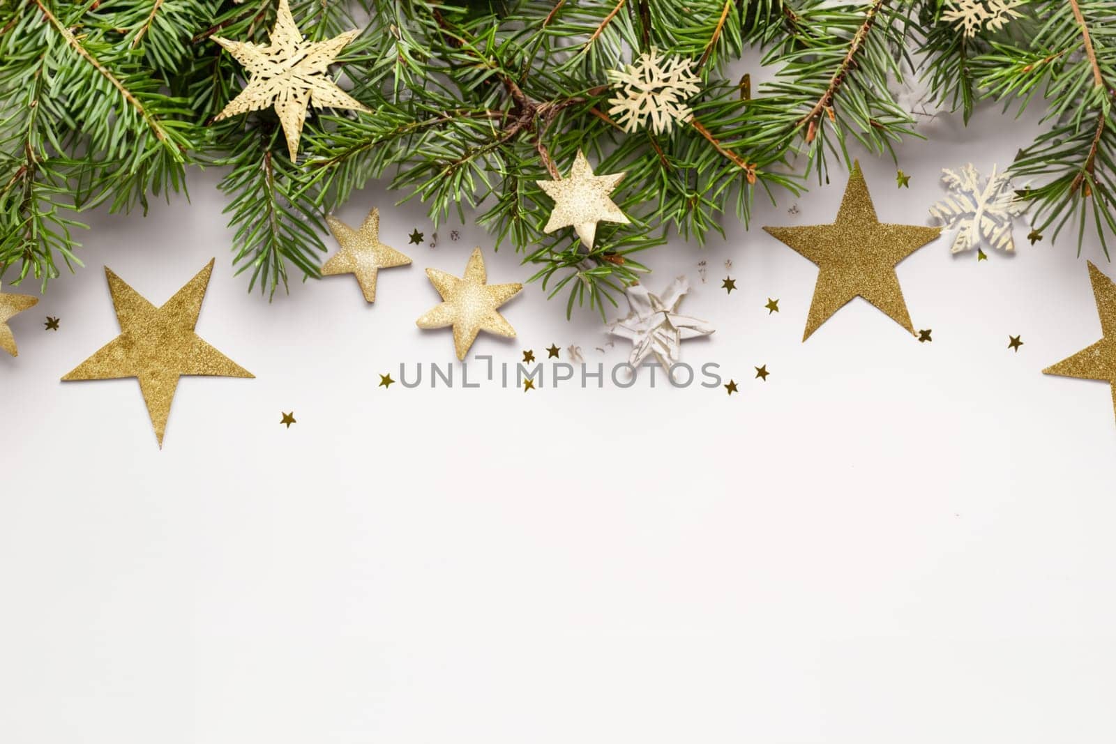 Christmas white wooden background top view. Template for New Year space for text. Mockup for advertising, congratulations. Holiday Greeting Cards Design. Christmas background with fir branches