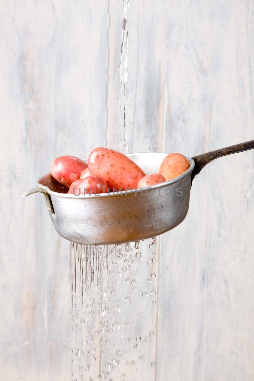 Potatoes in a sieve