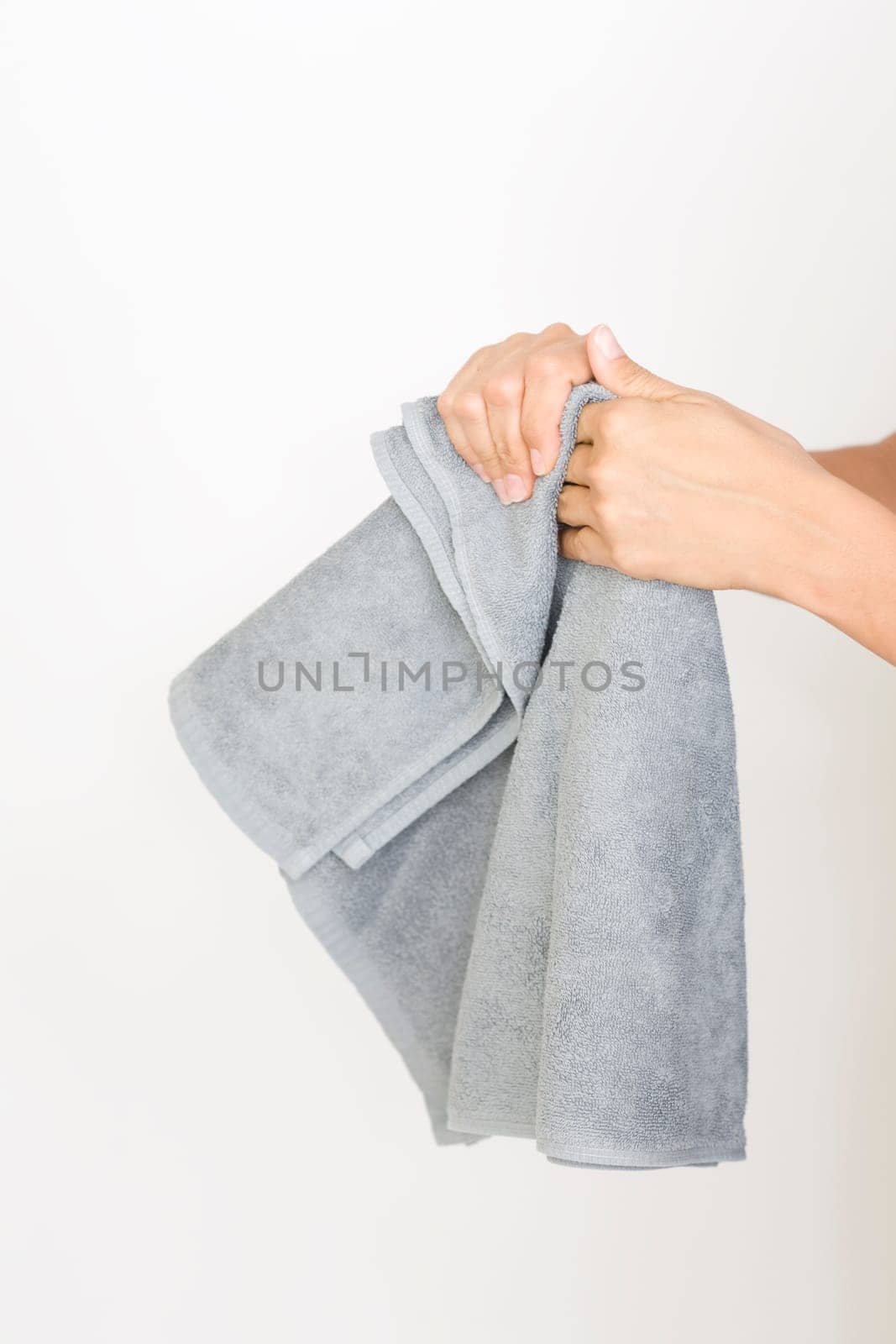 Drying hands with a towel