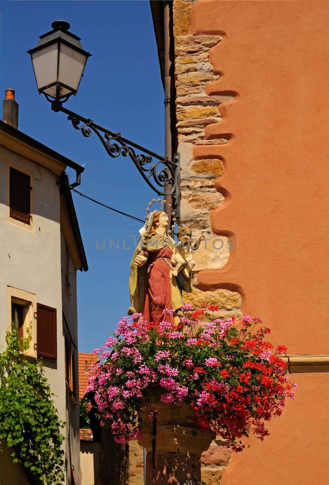 Statue of the Virgin Mary as fountain decoration,Westhalten,Alsace,France