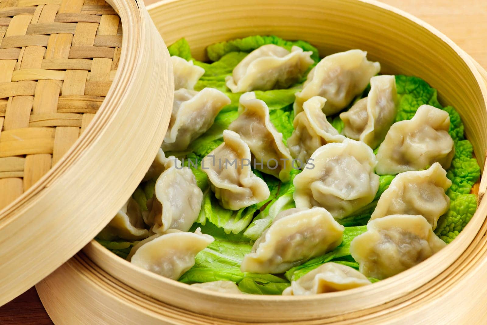 Bamboo steamer with dumplings