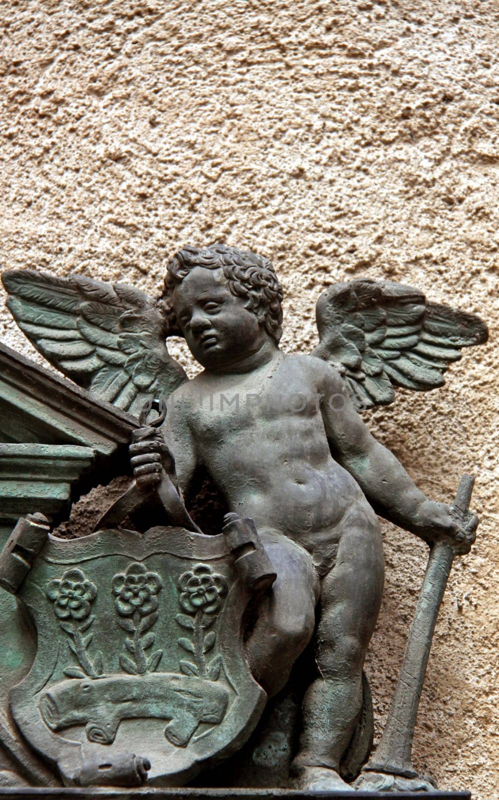 In sculpture and painting,a cherub is a child's figure who appears scantily clad or naked ... with or without wings.