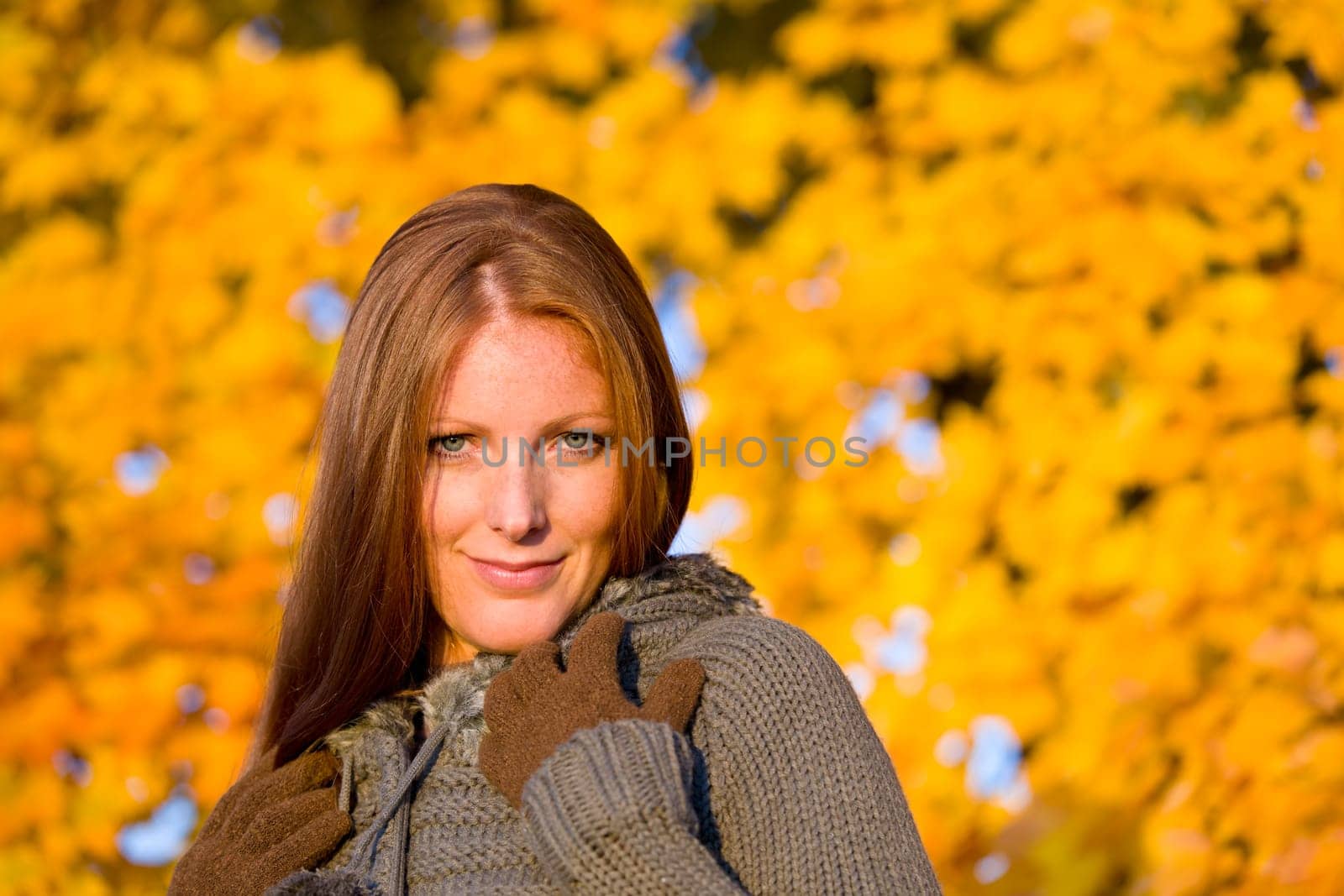 Autumn sunset park - red hair woman fashion