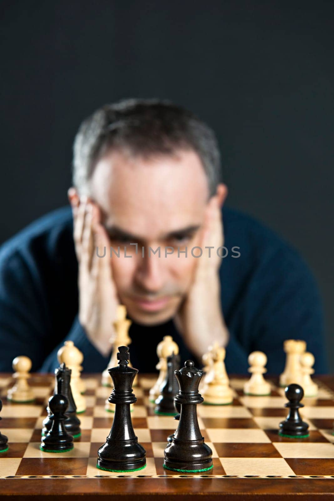 Man at chess board