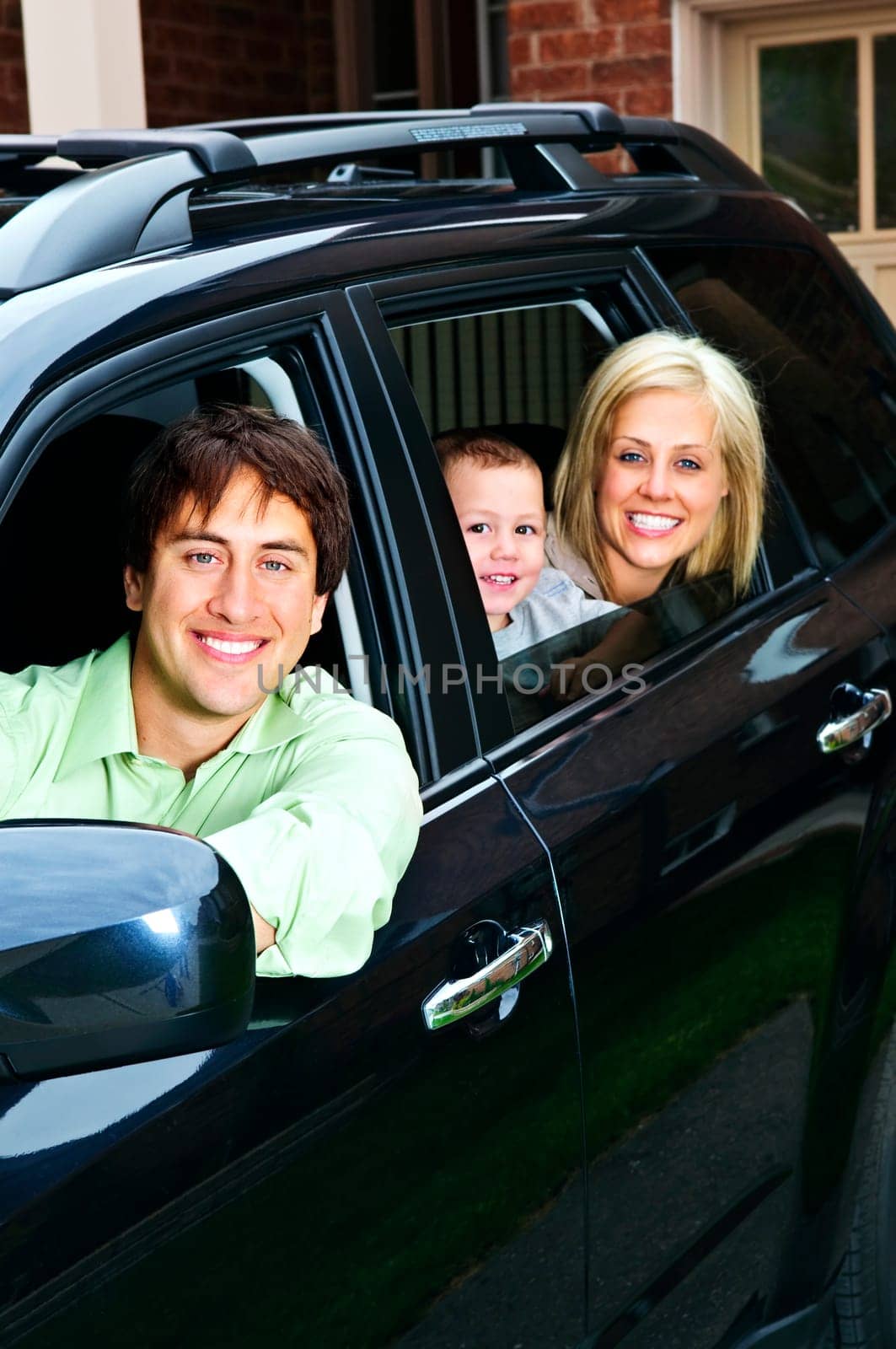 Happy family in car