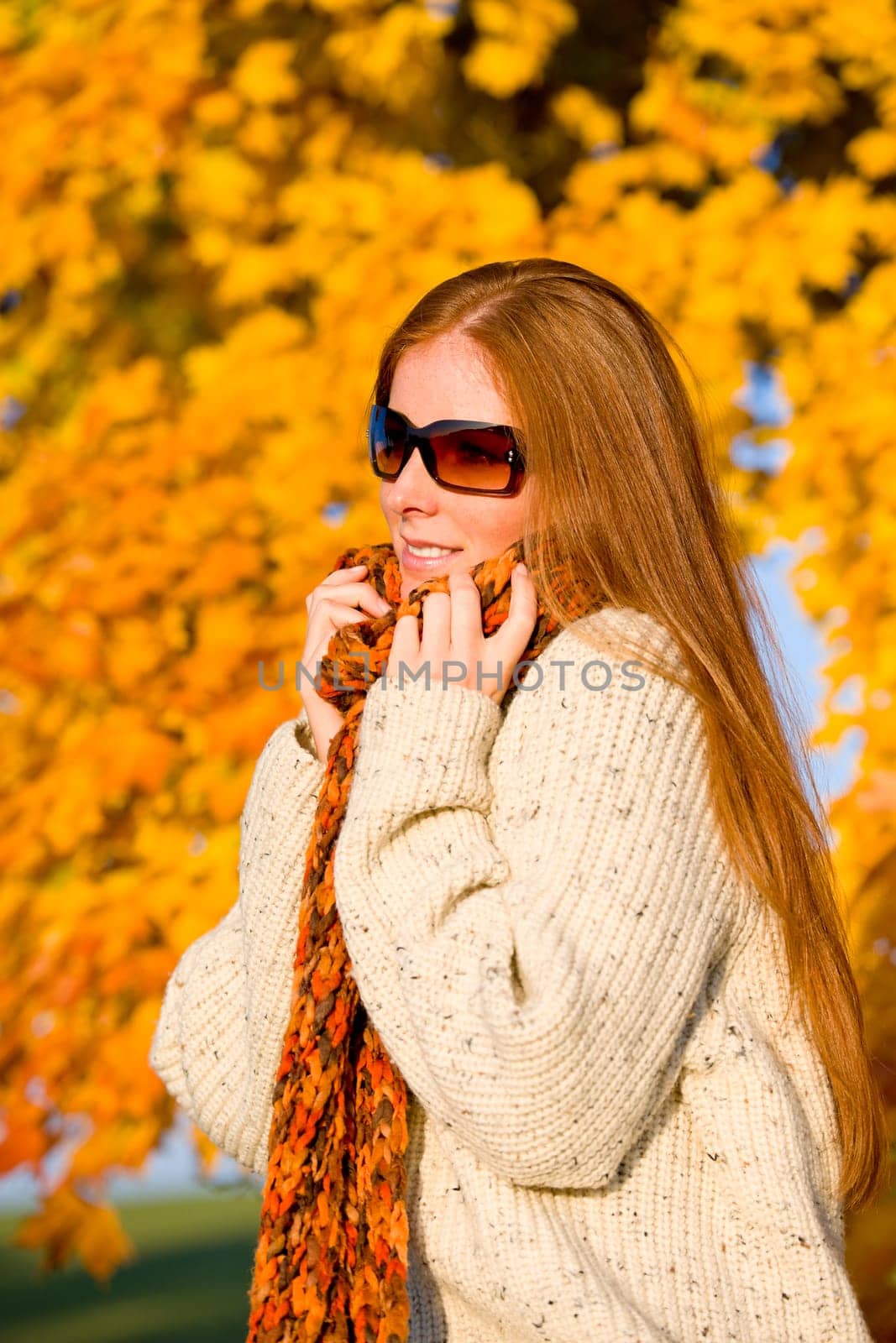 Autumn country sunset - red hair woman