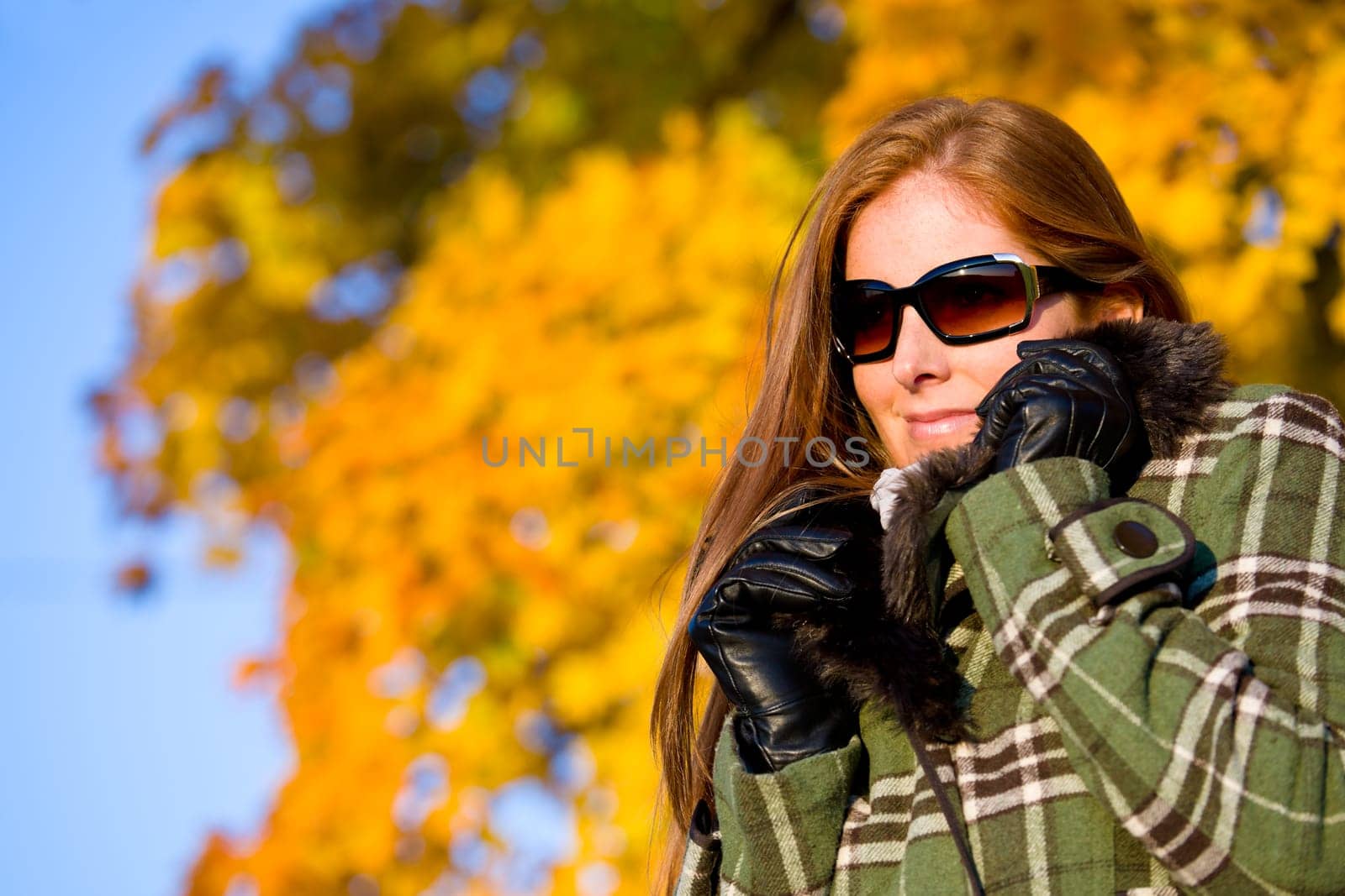 Autumn sunset park - red hair woman fashion
