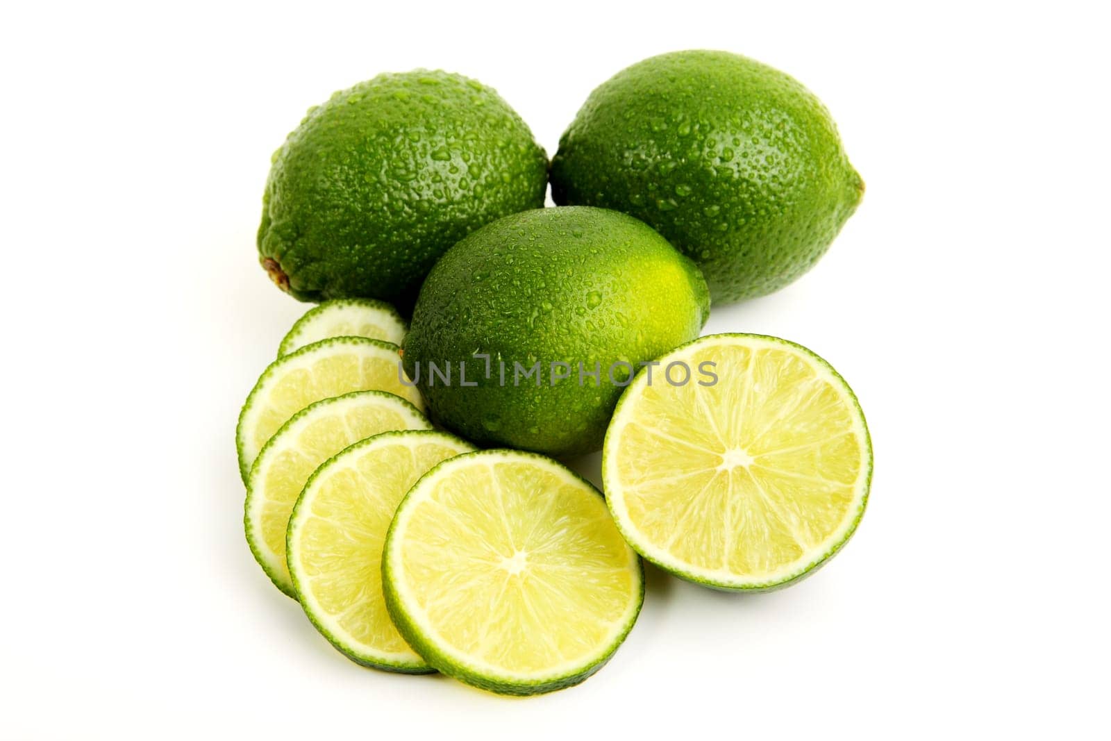 fresh limes with half and slices