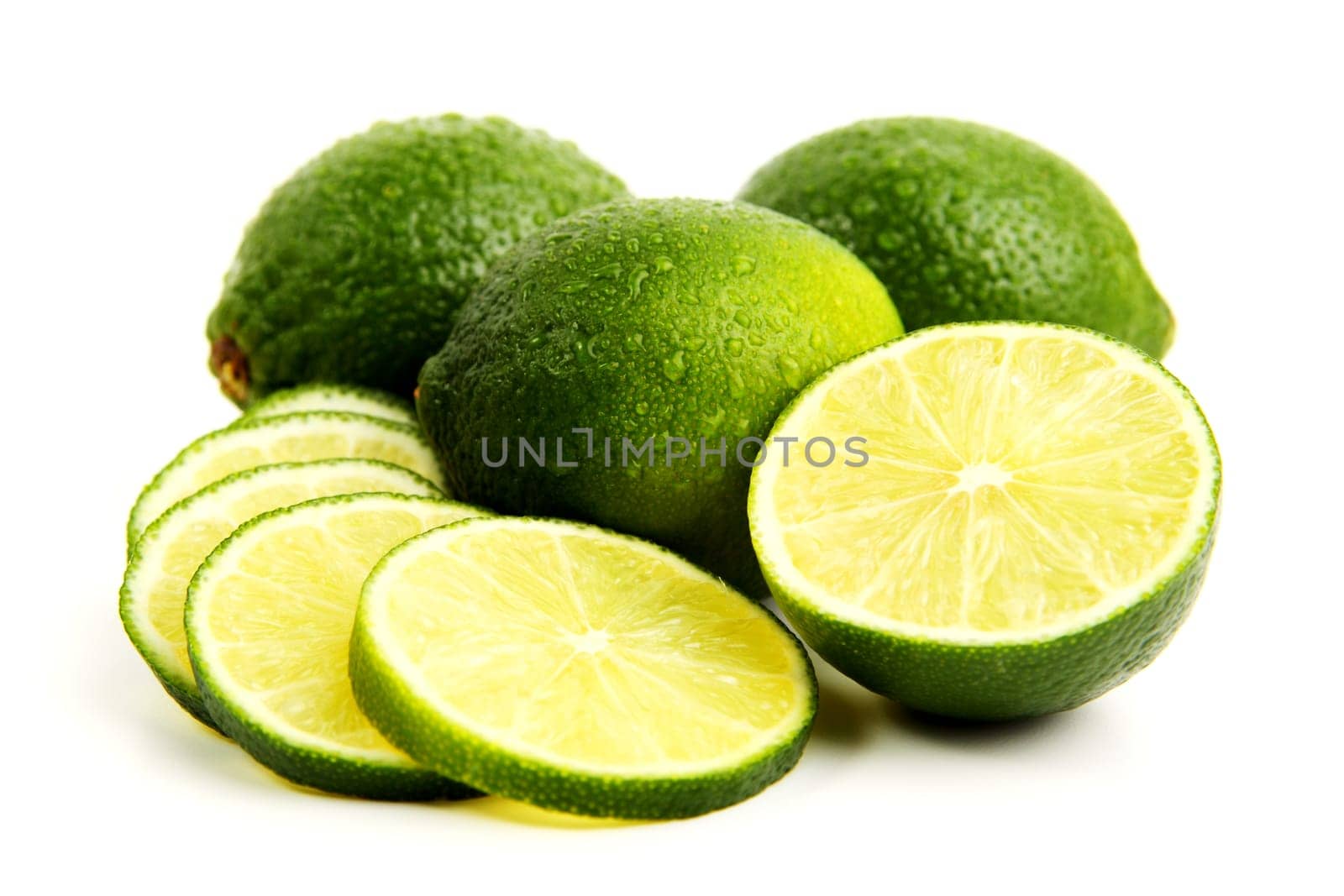 fresh limes with half and slices