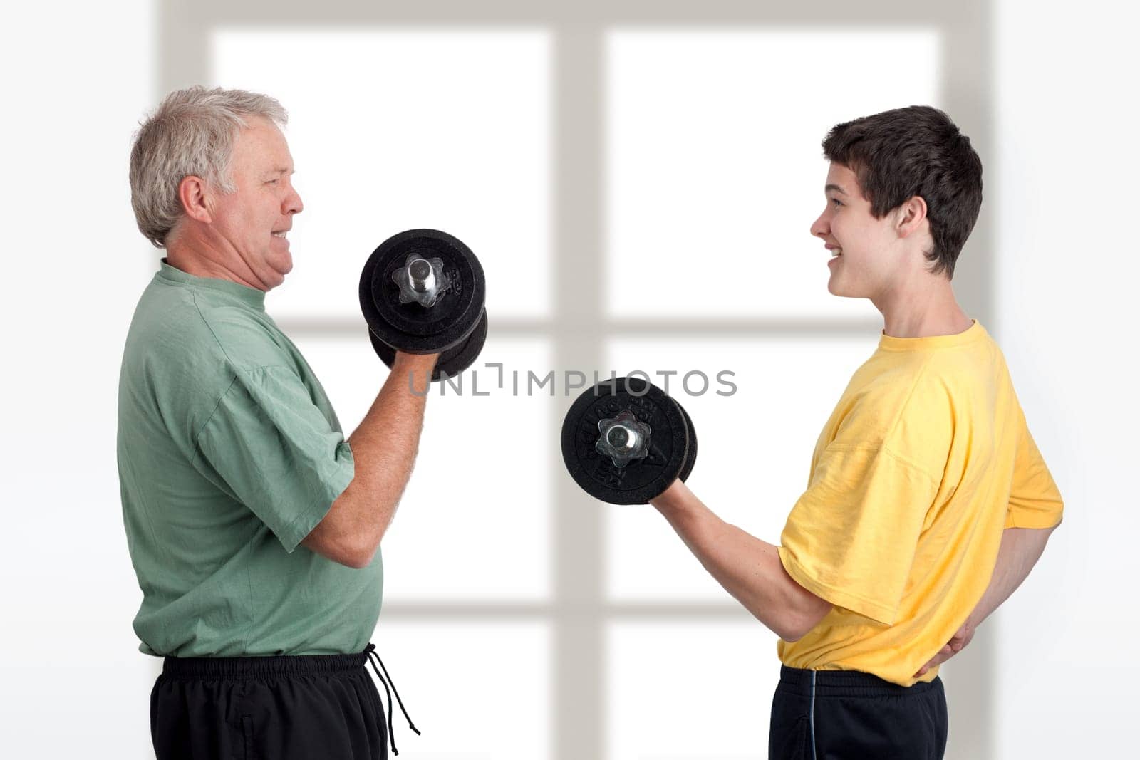 Father and son doing weight lifting