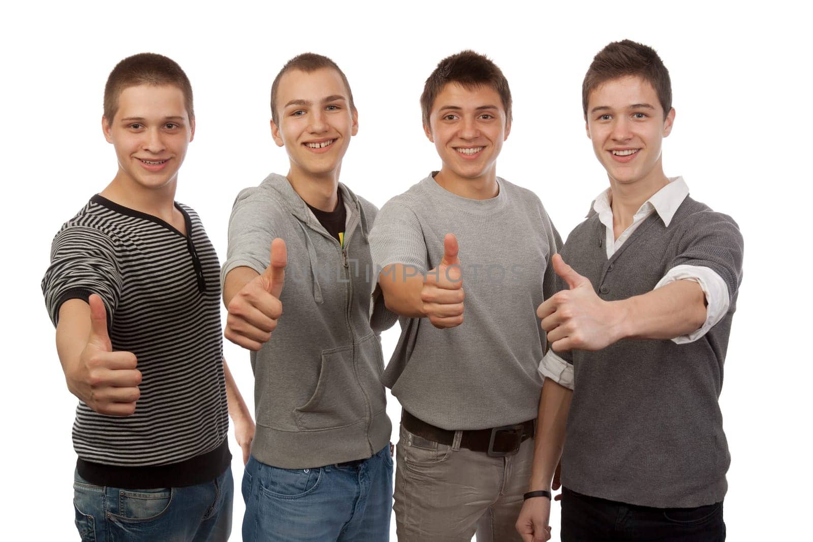 Four young friends gesturing ok