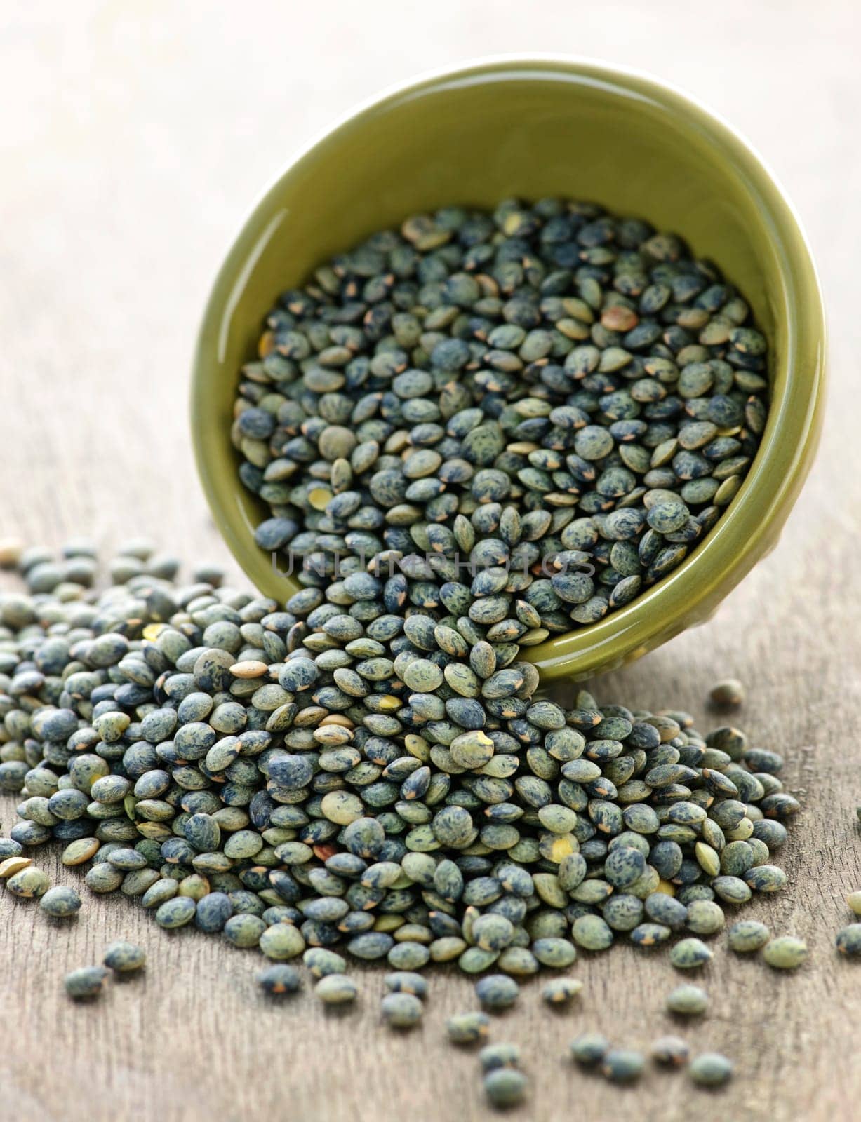 Bowl of uncooked French lentils