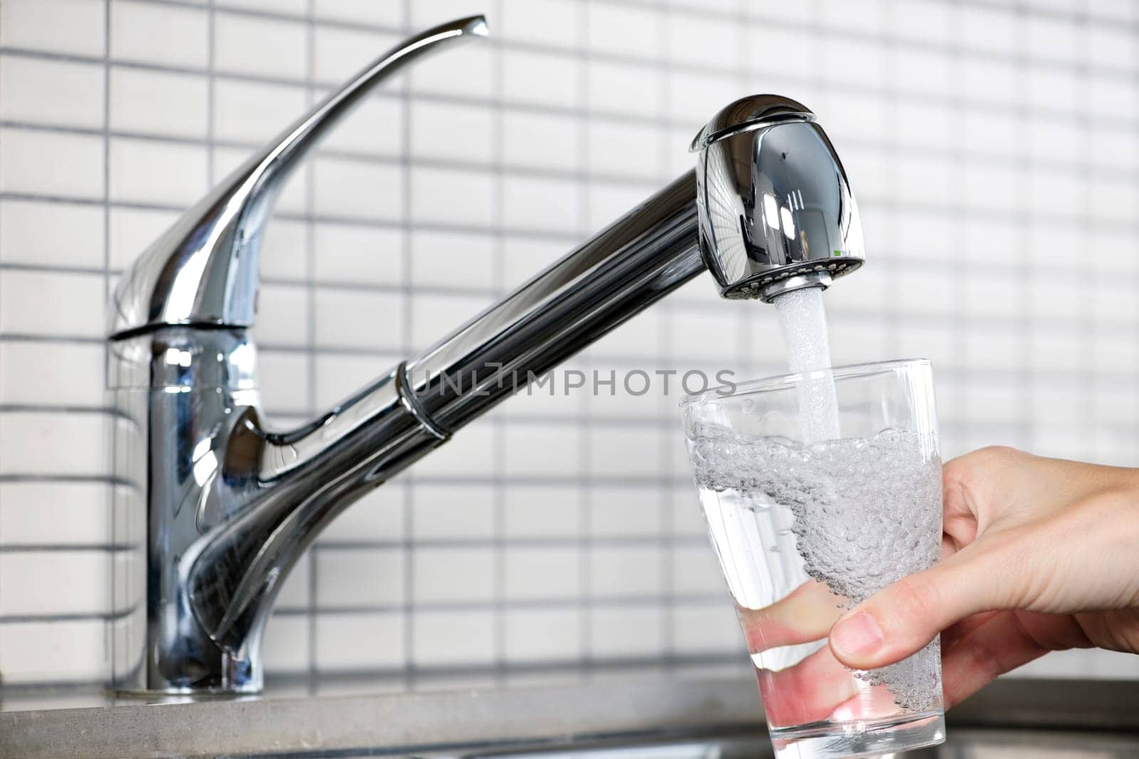 Filling glass of tap water