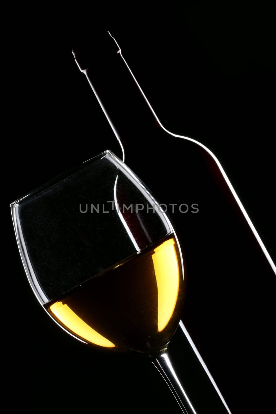 White wine bottle and glass