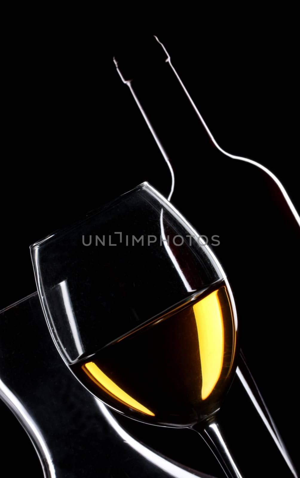 White wine bottle and glass