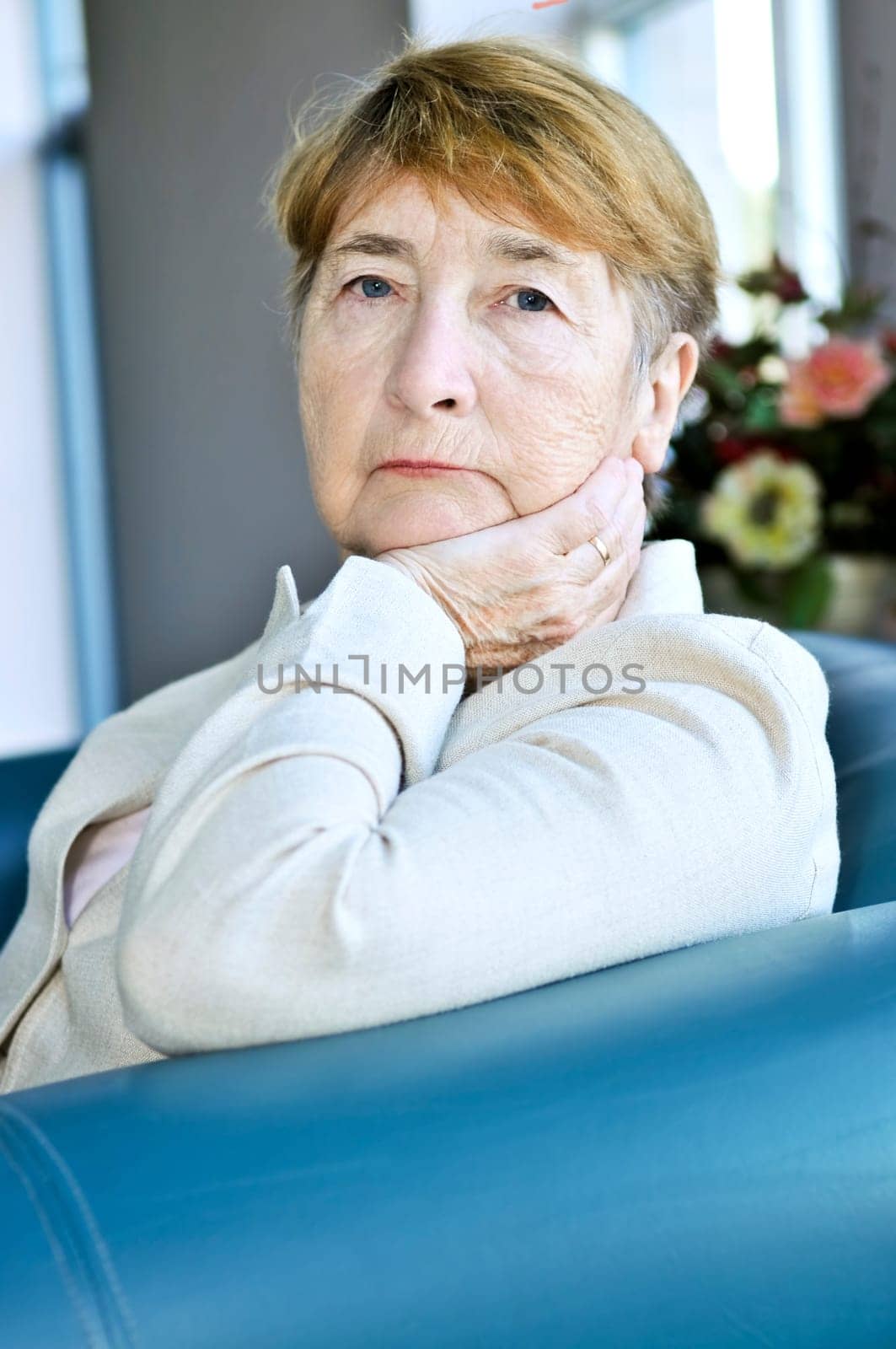 Sad elderly woman