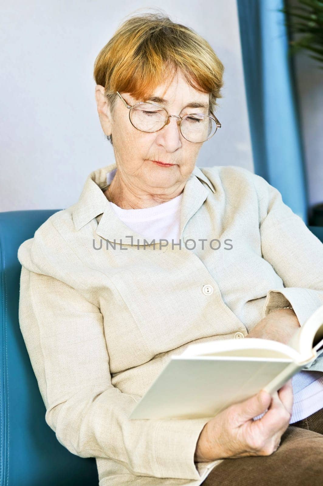 Old woman reading book