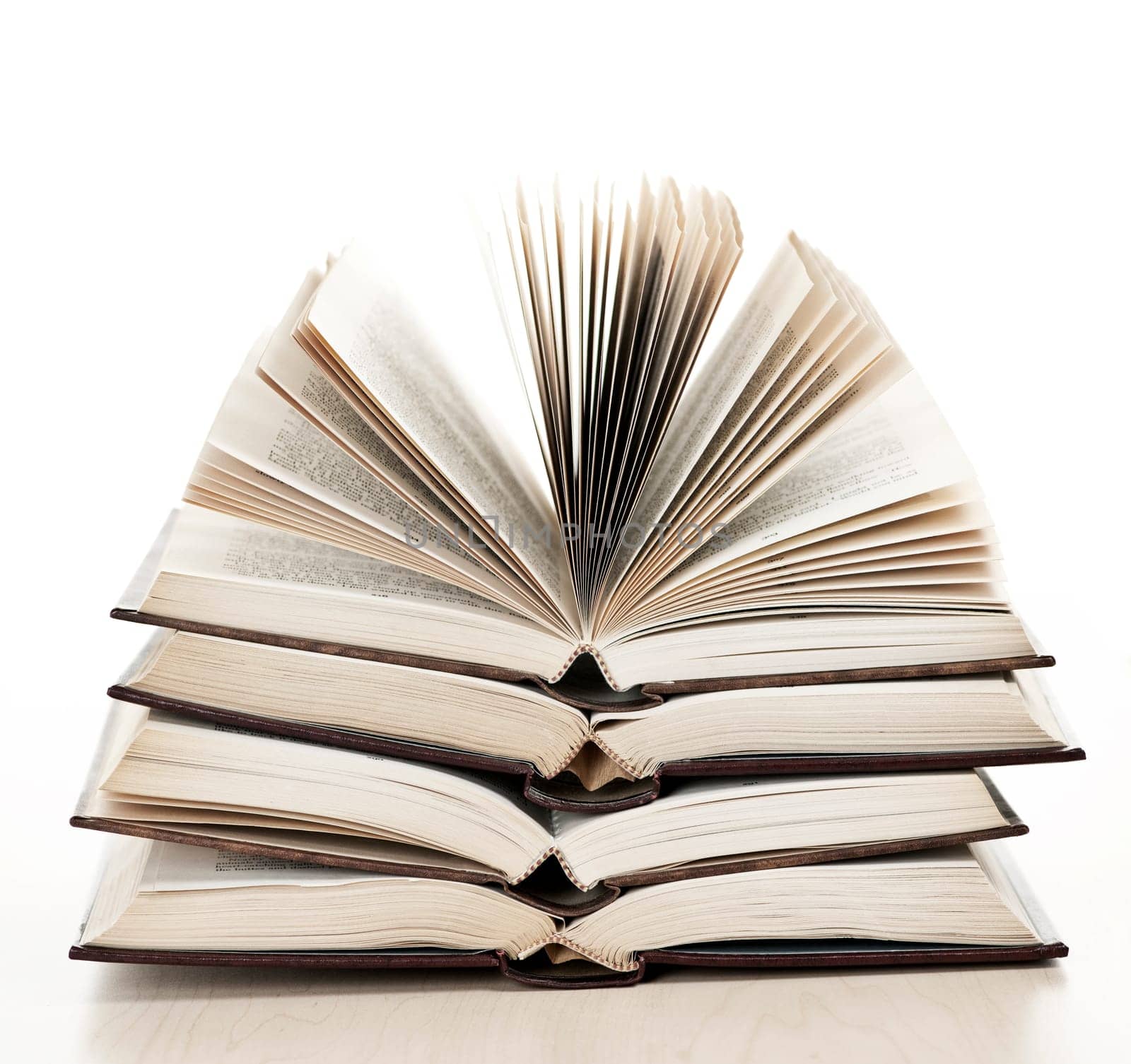 Stack of open books