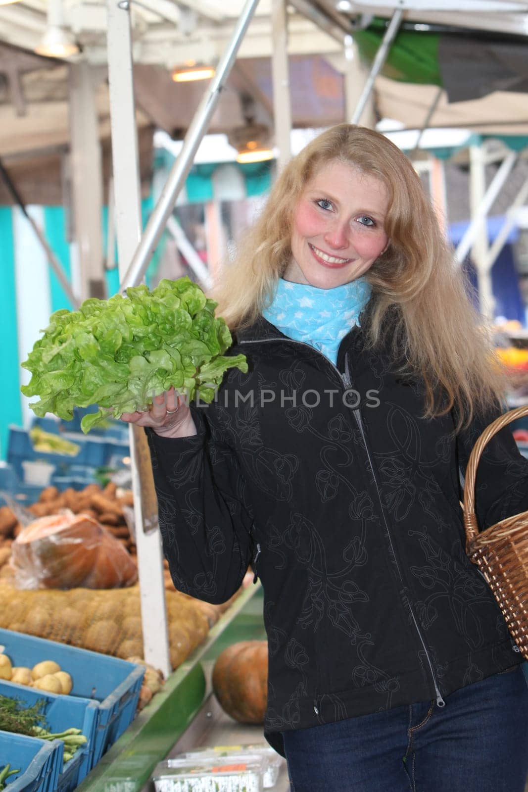 Young woman at the market buys