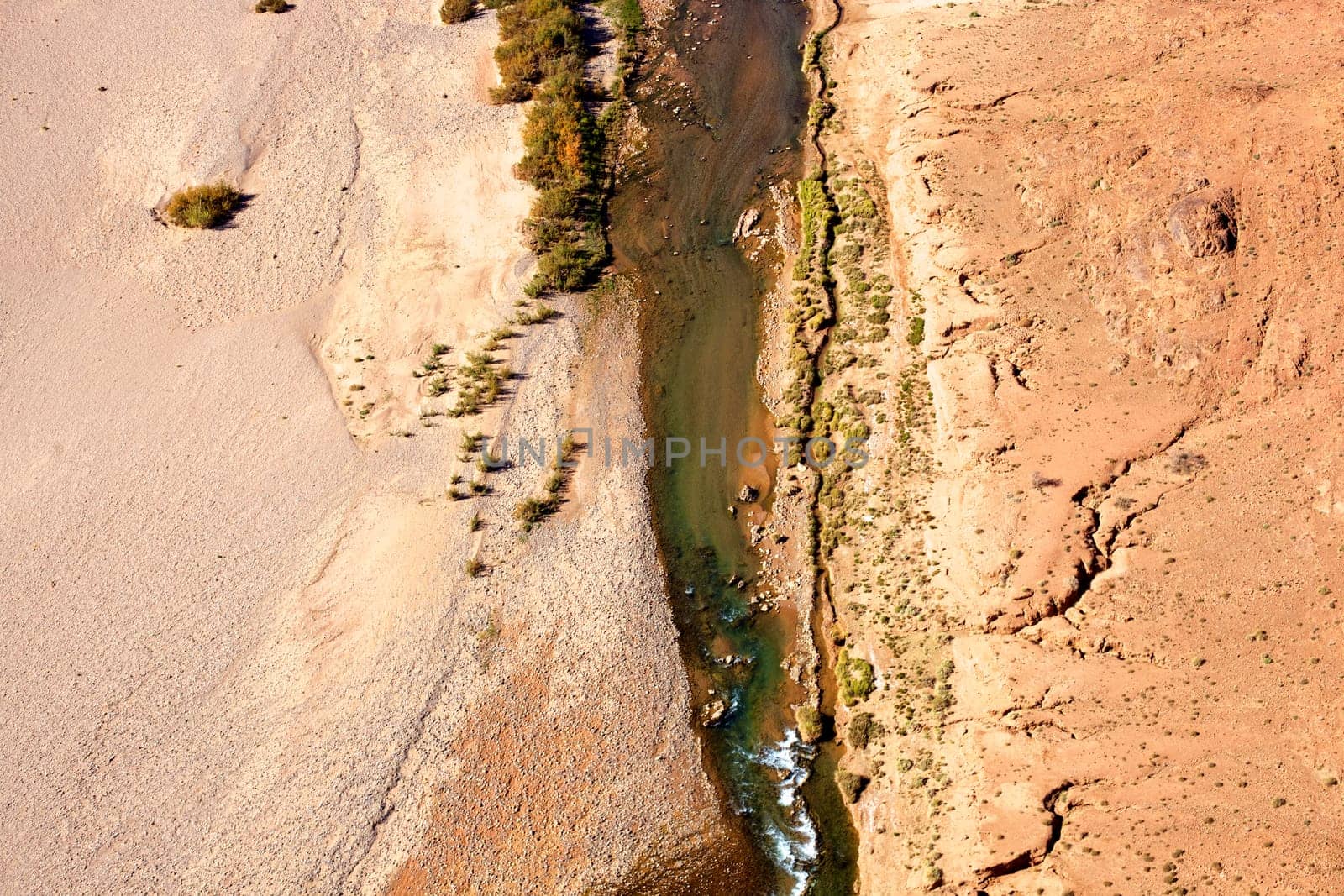 Aerial Sahara desert photo with river