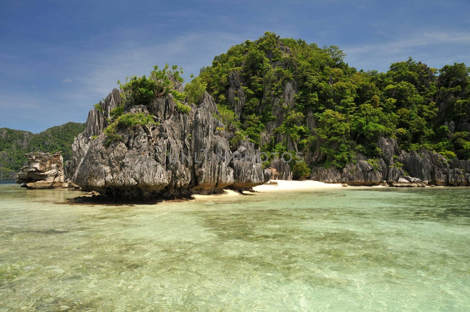 Small beach between limestone cliffs in Palawan / Philippines
