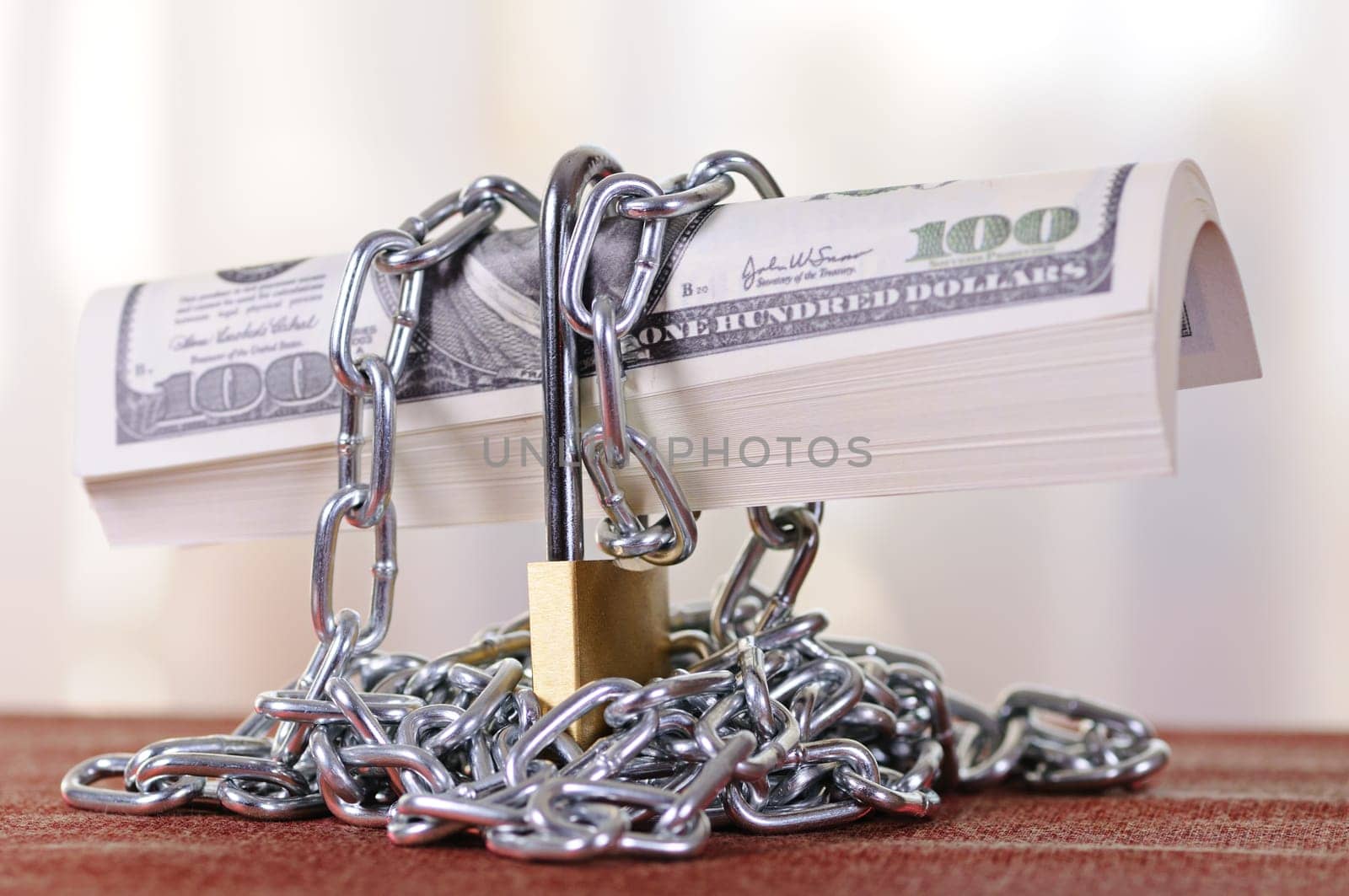 padlock with dollars