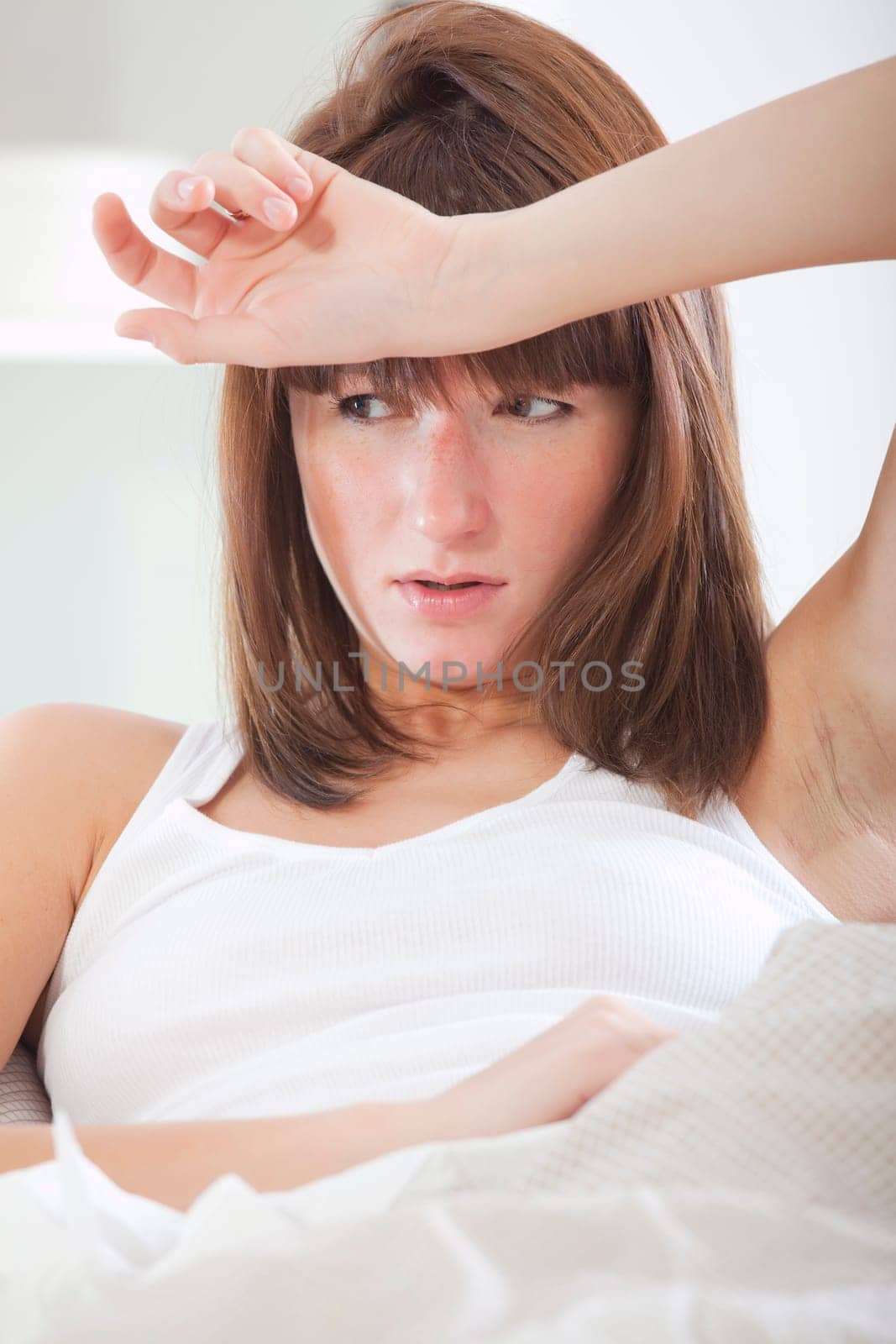 ill woman in bed