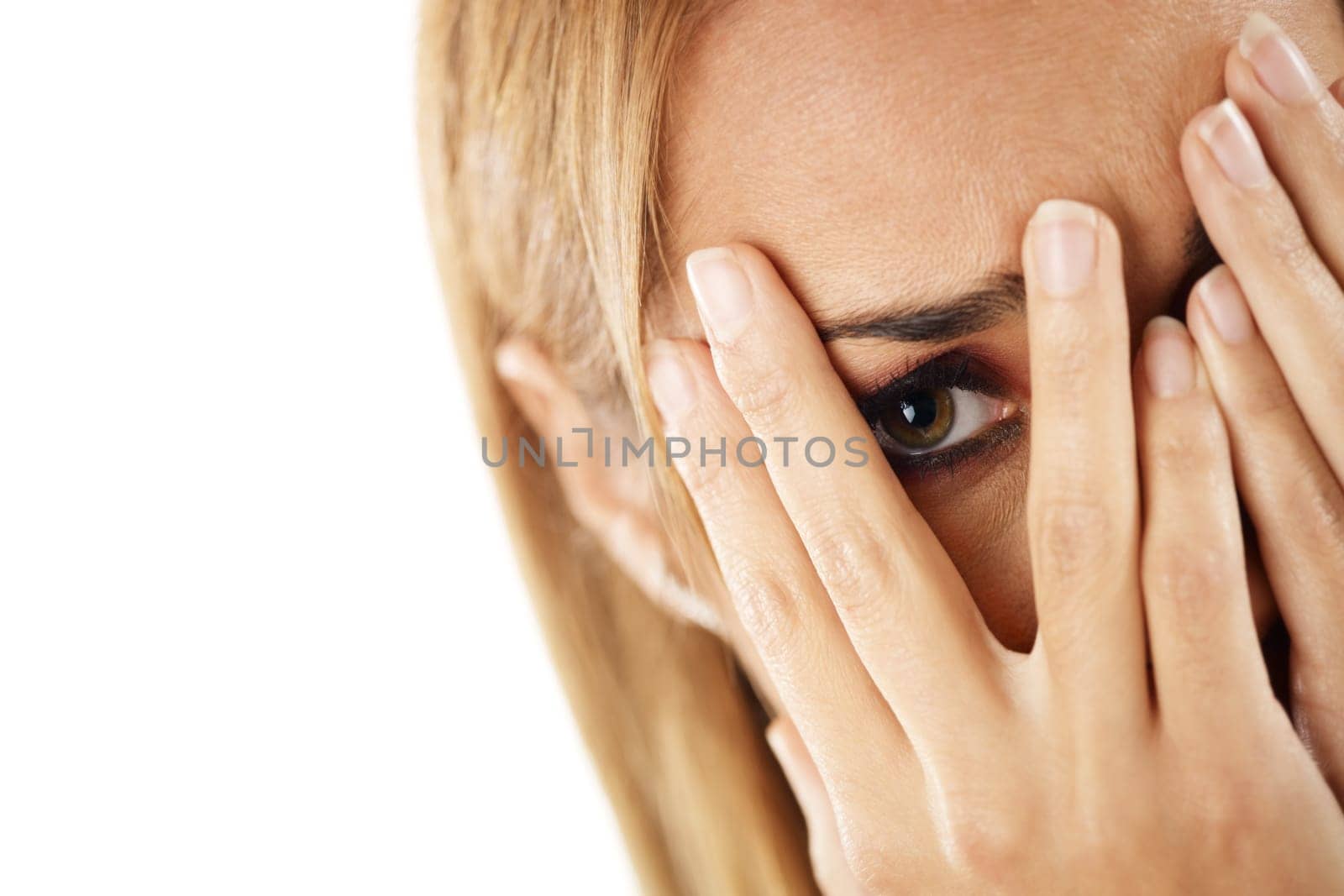 woman looking through fingers