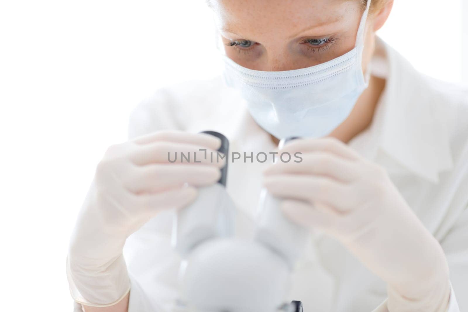 Microscope laboratory - woman medical research