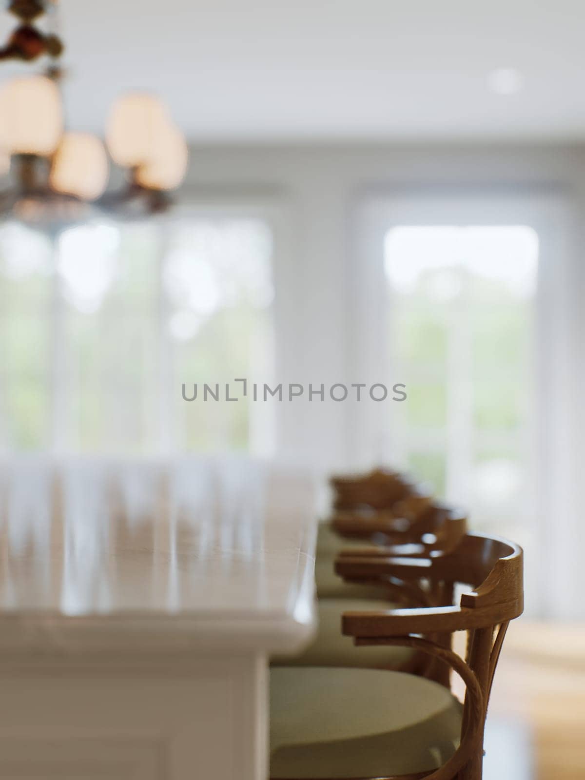 Kitchen white countertop with white marble, with blurred bokeh background. Presentation of goods in the kitchen interior on the countertop surface. 3D rendering