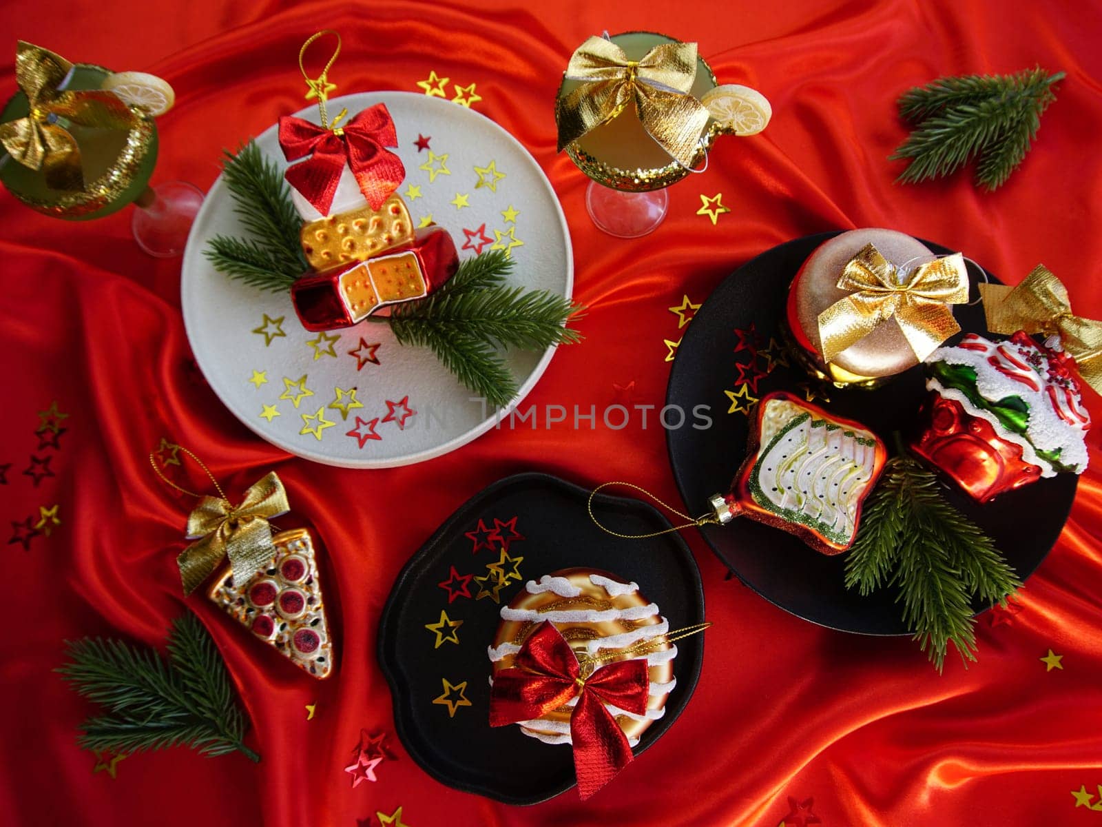 New Year's desserts. Creative table setting with Christmas tree toys. by Spirina