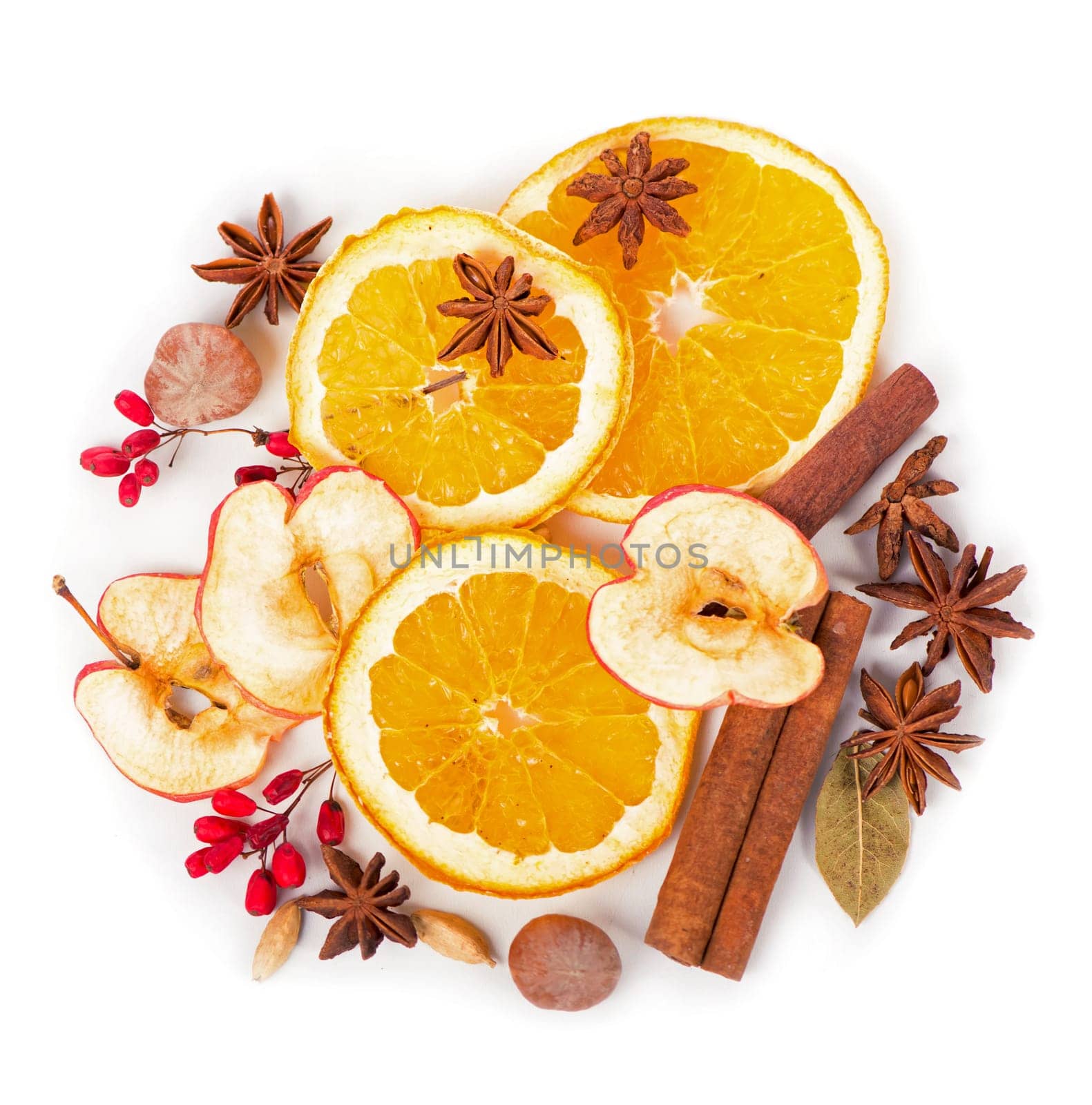 Christmas spices - cinnamon, anise, nuts, apples and dried orange slices by aprilphoto